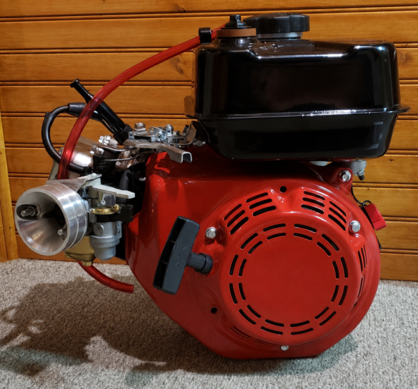 878f03cc-5d6a-4ecf-bd65-3c9ba430d354 Dukar 212 tank on engine CS stock carb built